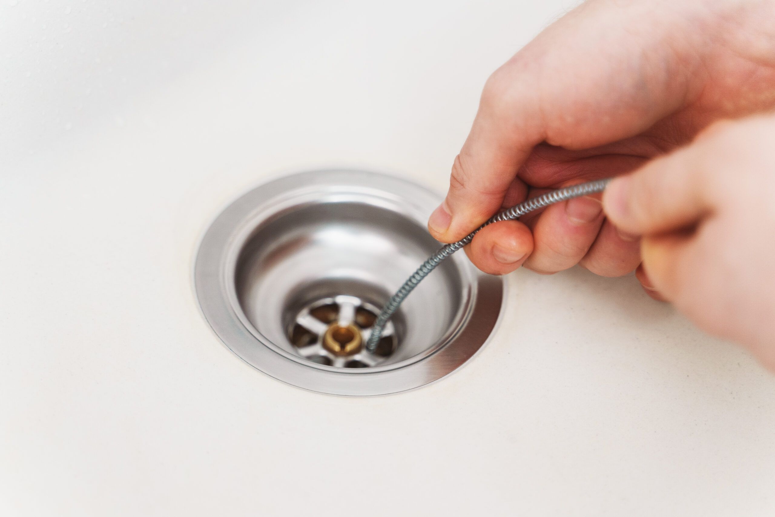 drain cleaning and plumbing repair in kitchen sink
