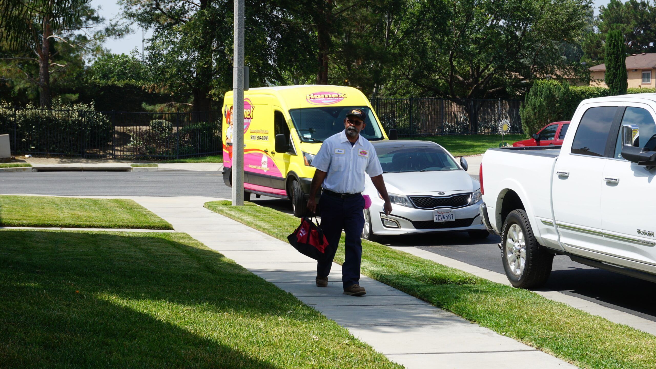 HomeX Plumber arriving to provide plumbing repairs and services