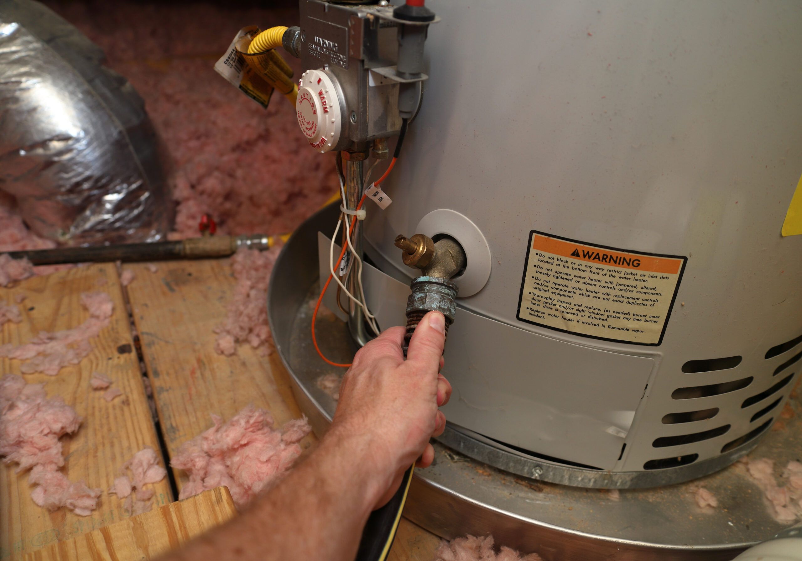 water heater leaking from bottom and in need of repair