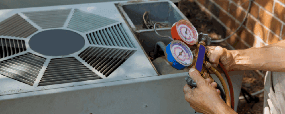 AC Tech doing preventative Maintenance work