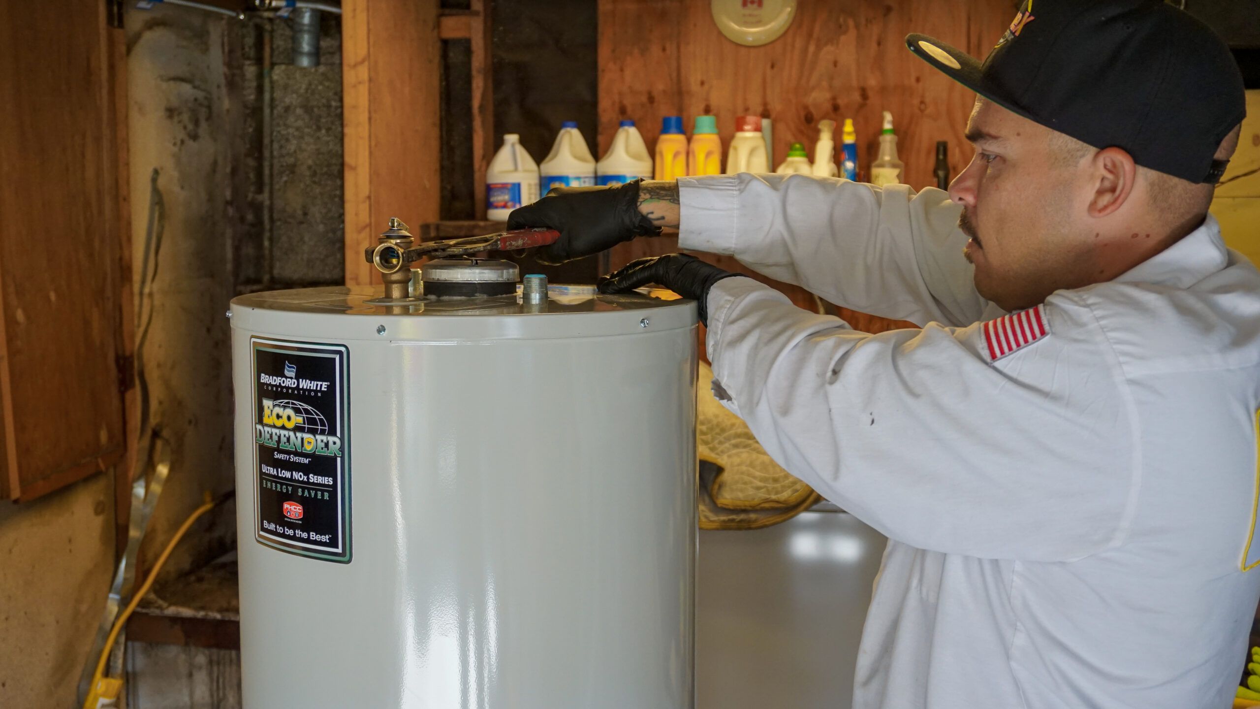 HomeX plumber installing water heater expansion tank