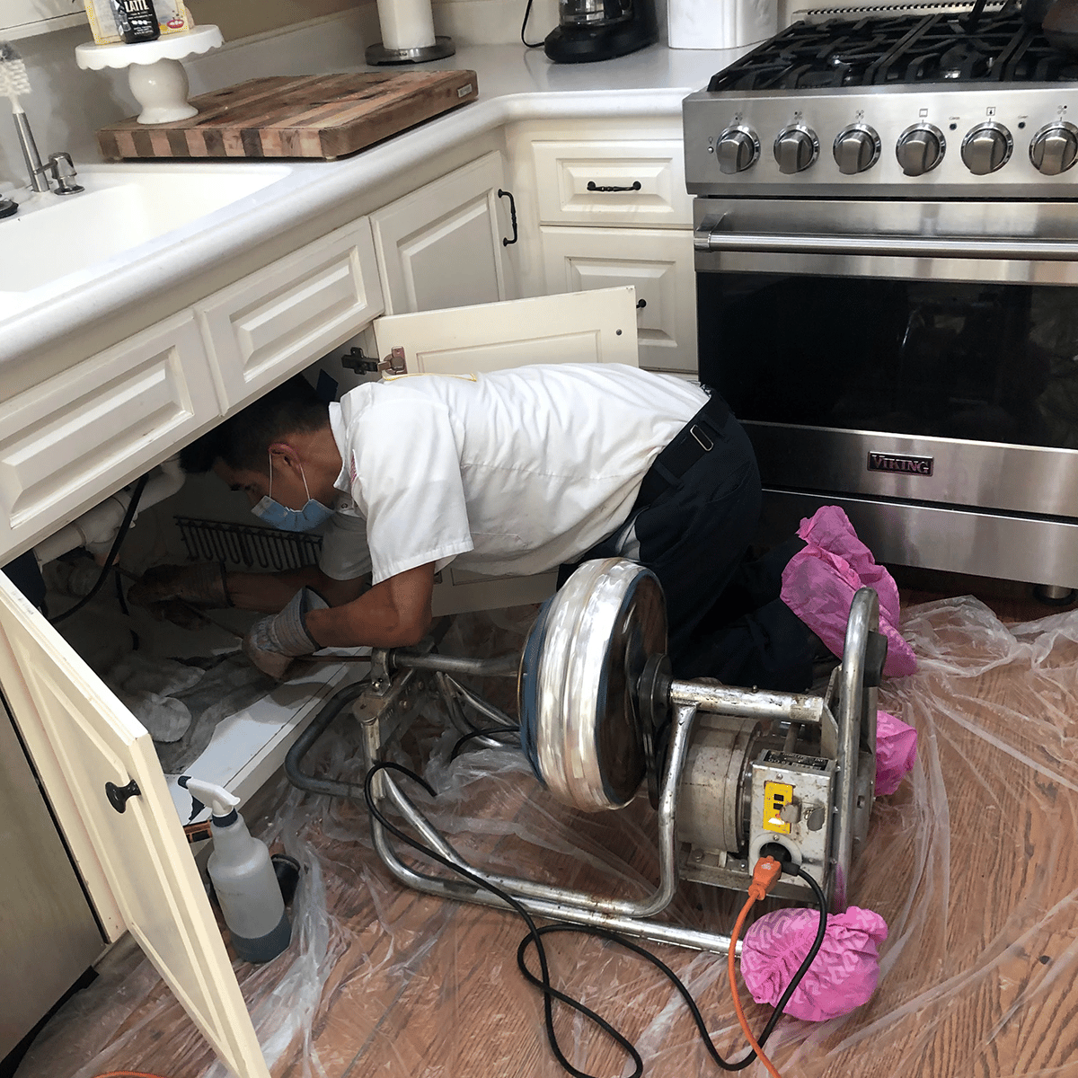 plumbing repairs and leak detection under kitchen sink