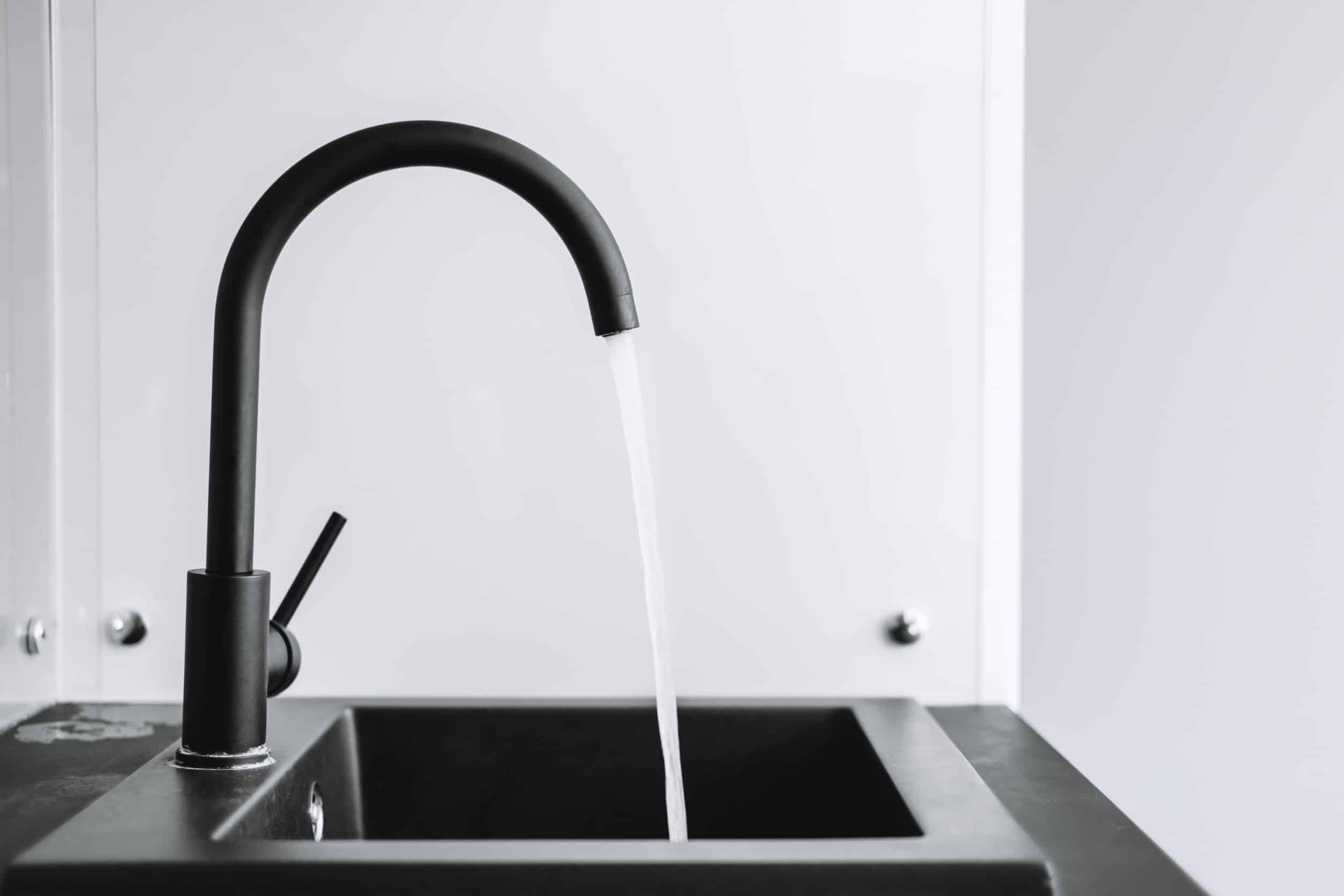 water running from kitchen faucet