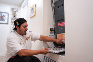Kahuna Comfort technician performing furnace maintenance and heating system check-up in Anaheim