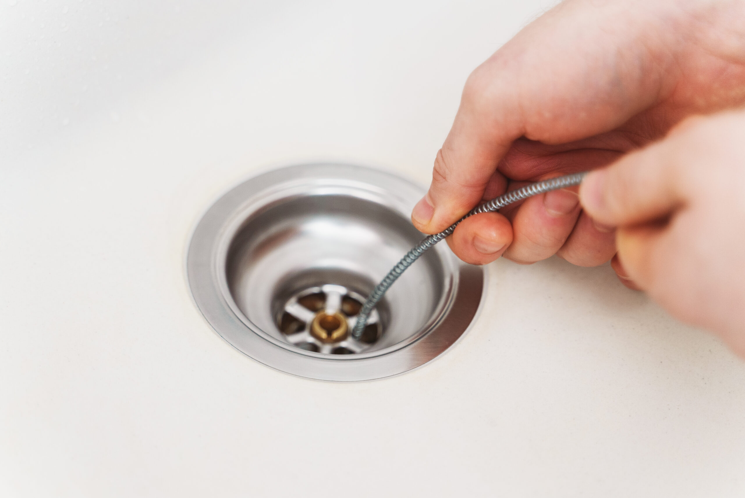 drain cleaning and plumbing repair in kitchen sink
